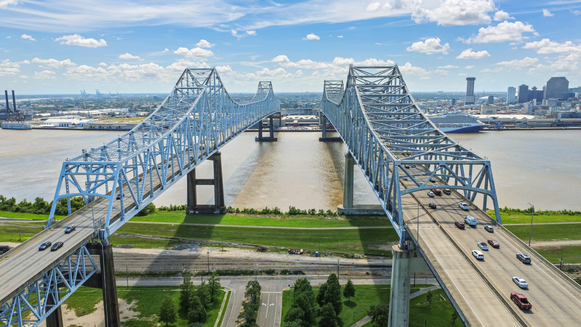 The Crescent City Connection bridge over the Mississippi River with the New Orleans skyline beyond